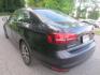 2017 Volkswagen Jetta SE (3VWB67AJ3HM) with an 1.4L L4 DOHC 20V engine, 5-speed manual transmission, located at 270 US Route 6, Mahopac, NY, 10541, (845) 621-0895, 41.349022, -73.755280 - Photo#4